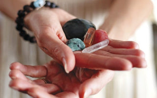 Collection of healing crystals including amethyst, citrine, rose quartz, clear quartz and selenite for mind body and spirit
