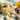 Healing crystals for abundance and prosperity including Citrine, Pyrite, Green Aventurine and Tigers Eye on a luxury background