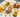 Natural Citrine crystals with roses styled on a luxury background for abundance and manifestation