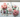 Rose quartz, rhodonite, green aventurine, prehnite and morganite crystals on white marble with soft pink roses — heart healing crystals for attachment wounds by Heavenly Crystals Online