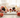Citrine, sunstone, rose quartz, carnelian and black tourmaline crystals on white marble with soft pink roses — uplifting crystals for depression support by Heavenly Crystals Online