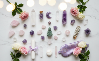 Affordable healing crystals and spiritual gifts under $50 arranged with roses and fairy lights
