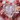 Love month crystals including kunzite, rhodochrosite, ruby and rhodonite for self-love, compassion and romance