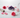 Selenite wand, amethyst, rose quartz and clear quartz with sage bundle and fresh pink roses on white marble — crystal cleansing guide by Heavenly Crystals Online