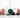 Malachite, clear quartz, shungite, amazonite and obsidian crystals on white marble with soft pink roses — healing crystals for somatic pain support by Heavenly Crystals Online