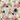 Crystals for healer burnout — selenite, rose quartz heart, amethyst and black tourmaline with pink peonies, white roses and gold candle on marble – Heavenly Crystals Online