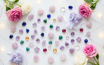 Tumbled stones and crystal chips arranged with roses and fairy lights