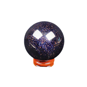 Blue Goldstone Sphere (glass with copper) with a wooden stand