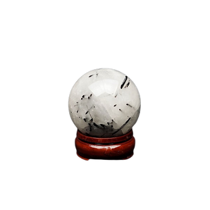 Tourmalinated Quartz Sphere with wooden stand - 341 grams
